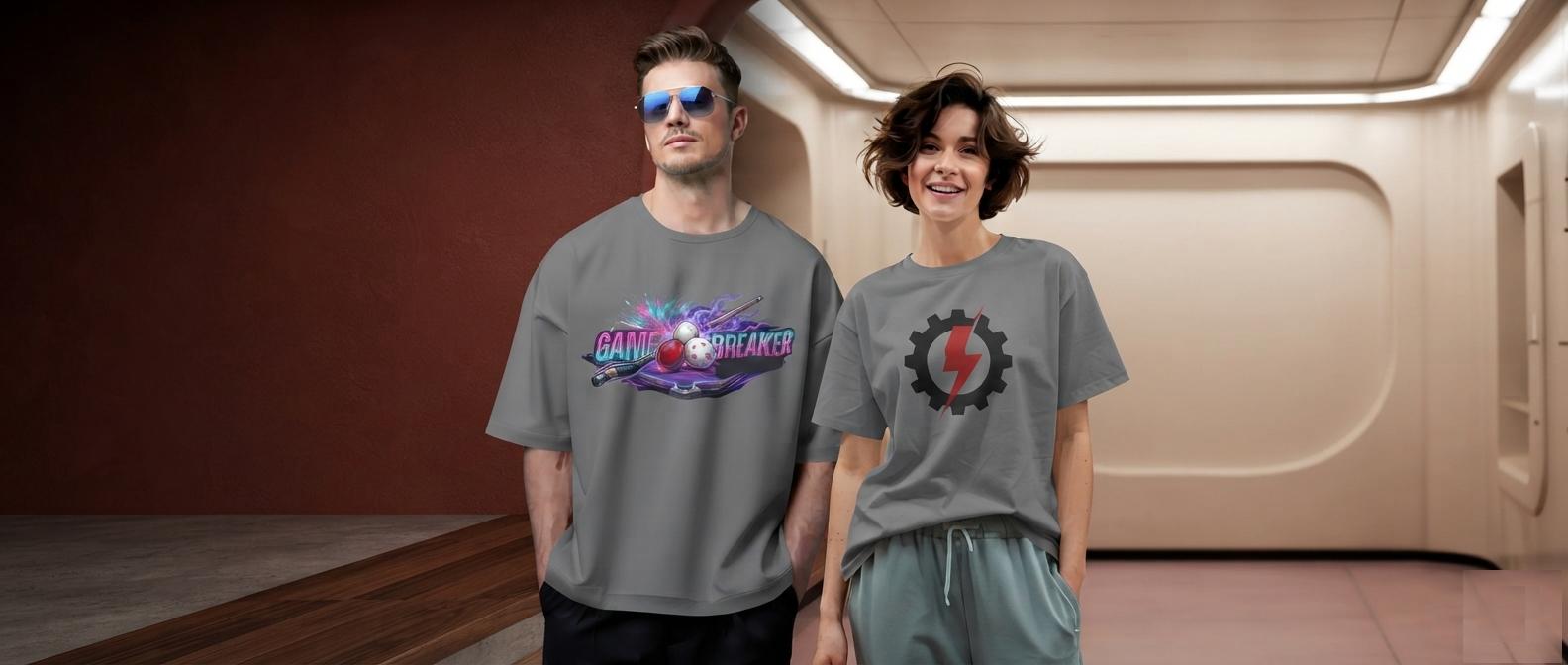 Man and woman wearing oversized graphic t-shirts from ctrl alt swag in warm minimalist studio light